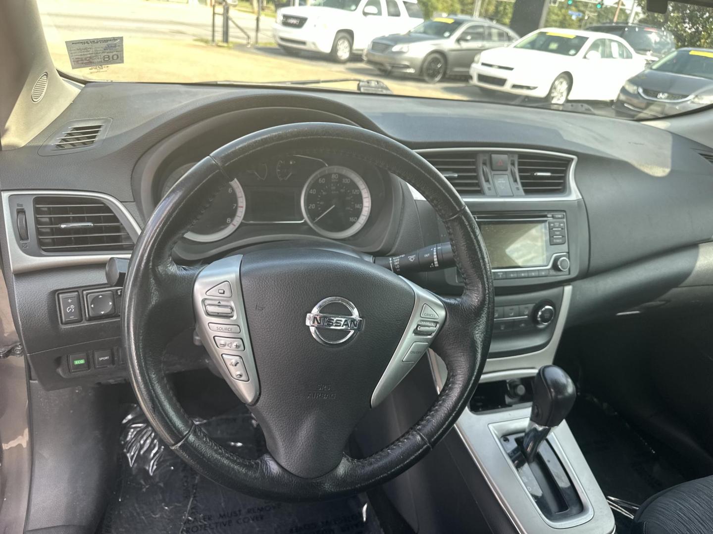 2015 Nissan Sentra S 6MT (3N1AB7APXFY) with an 1.8L L4 SFI DOHC 16V engine, 6-Speed Manual transmission, located at 419 N 18th St., Monroe, LA, 71201, (318) 410-9250, 32.514370, -92.105133 - Photo#1