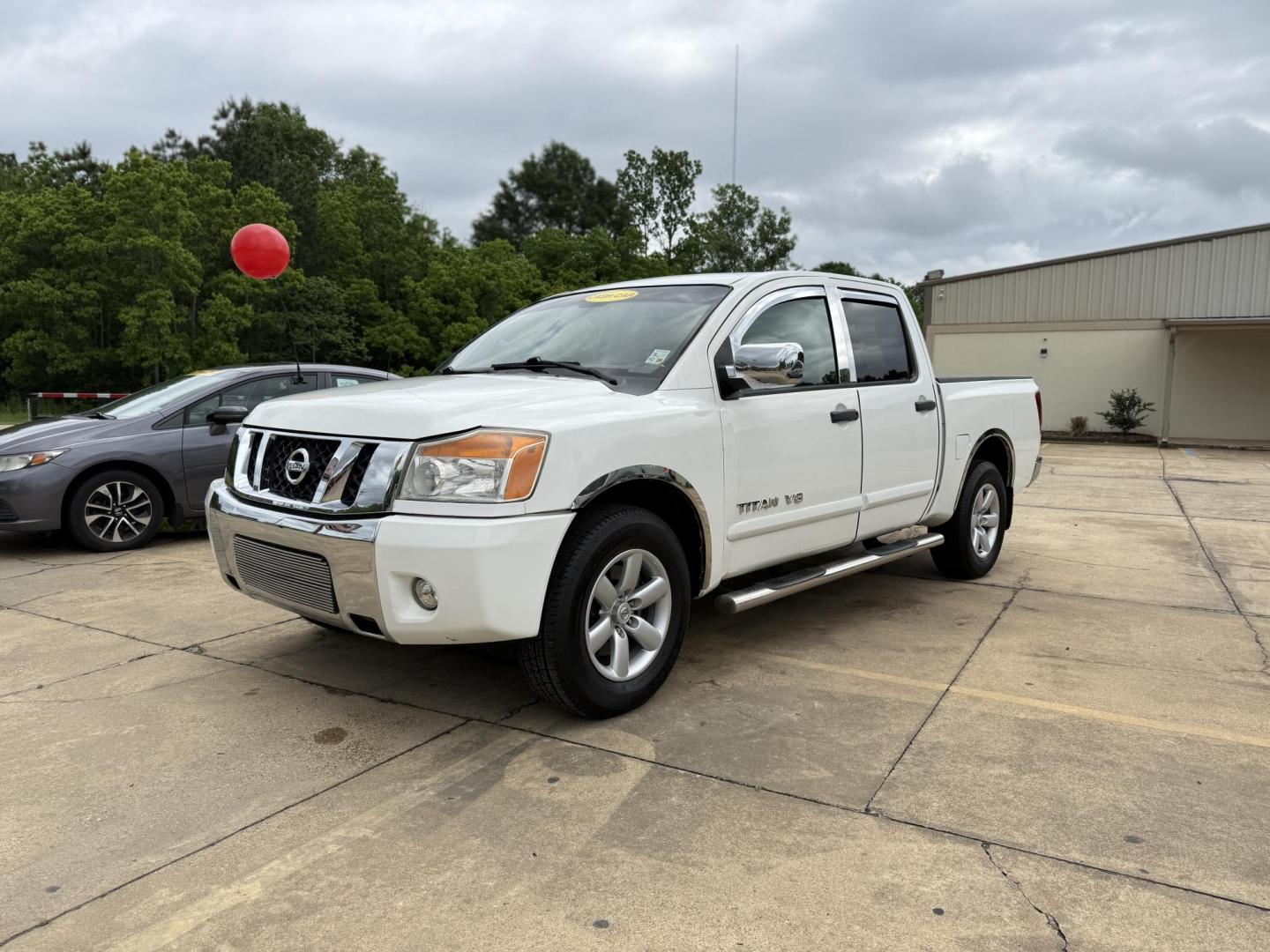 2009 Nissan Titan LE Crew Cab 2WD SWB (1N6BA07D59N) with an 5.6L V8 DOHC 32V FFV engine, 5-Speed Automatic Overdrive transmission, located at 419 N 18th St., Monroe, LA, 71201, (318) 410-9250, 32.514370, -92.105133 - Photo#0