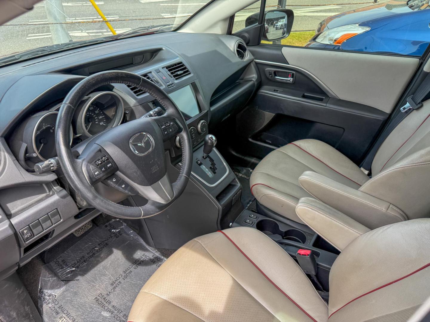 2011 Mazda MAZDA5 Grand Touring (JM1CW2DL7C0) with an 2.5L L4 DOHC 16V engine, 5-Speed Automatic transmission, located at 419 N 18th St., Monroe, LA, 71201, (318) 410-9250, 32.514370, -92.105133 - Photo#2